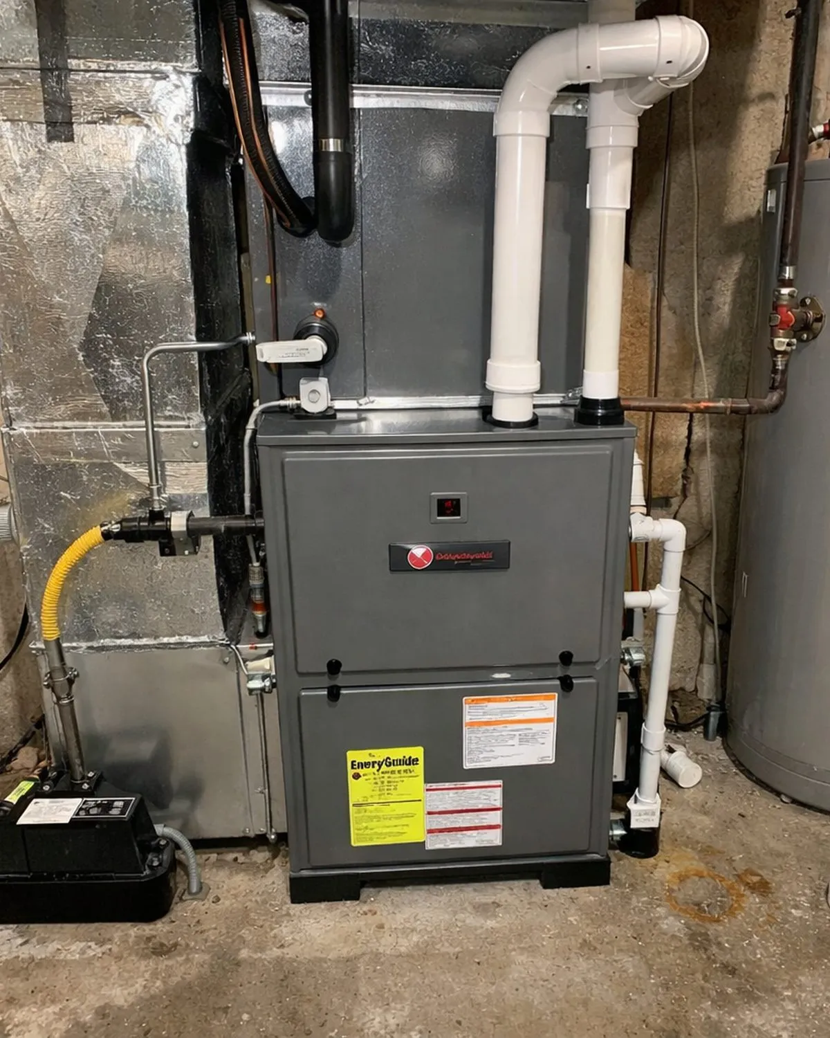 High-efficiency gas furnace installed in a basement